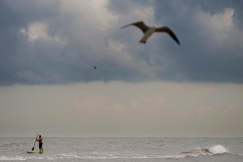 Dark clouds hang low over the horizon as Tropical Storm Edouard makes its way towards landfall in Galveston, Texas, Tuesday, Sept. 1, 2026. (Brett Coomer/Houston Chronicle via AP)