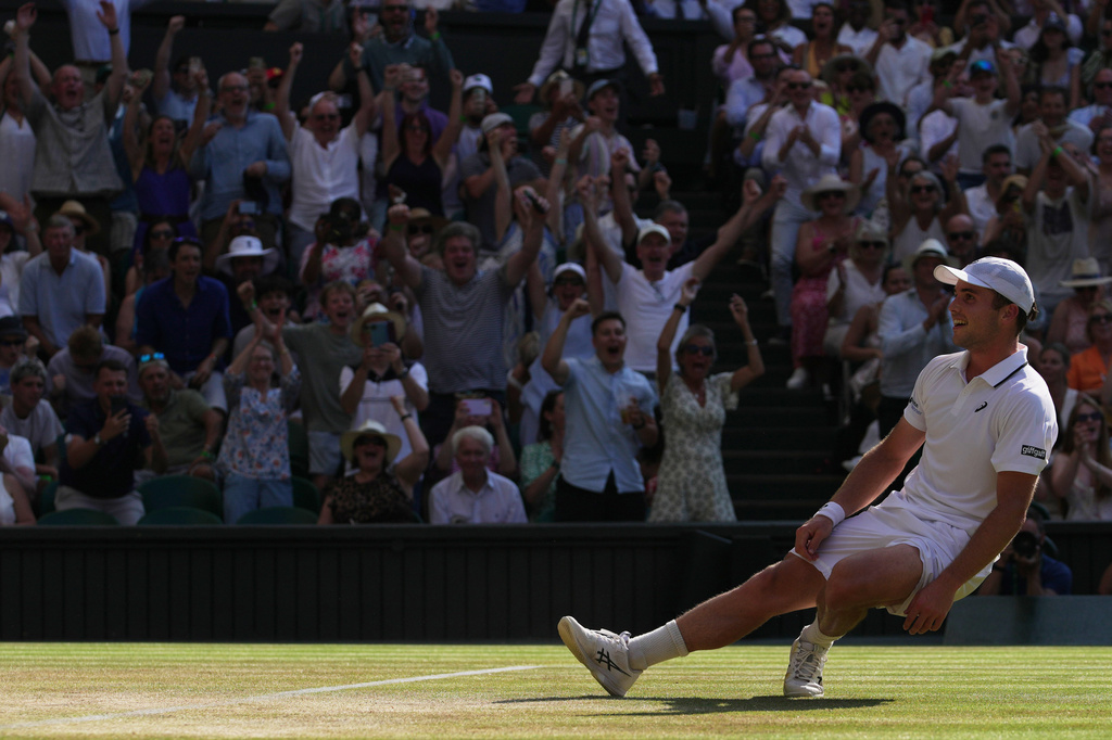Arthur Fery of Britain reacts to winning against Flavio Cobolli of Italy in their quarter-final men's singles match at the Wimbledon Tennis Championships in London, Wednesday, July 8, 2026. (AP Photo/Brian Inganga)