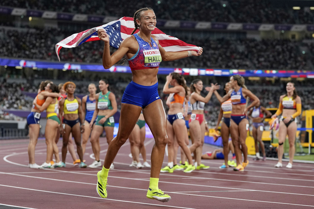 United States' Anna Hall celebrates after wining the gold in the heptathlon at the World Athletics Championships in Tokyo, Saturday, Sept. 20, 2025. (AP Photo/Petr David Josek)