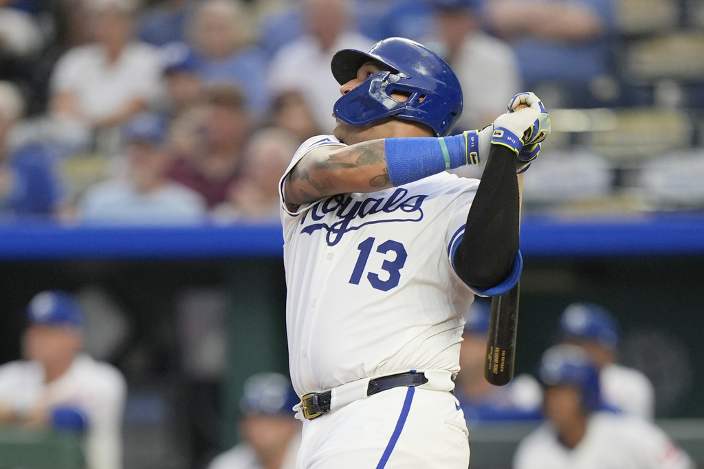 Kansas City Royals' Salvador Perez watches his three-run home run during the first inning of a baseball game against the Seattle Mariners, Wednesday, Sept. 17, 2025, in Kansas City, Mo. (AP Photo/Charlie Riedel)