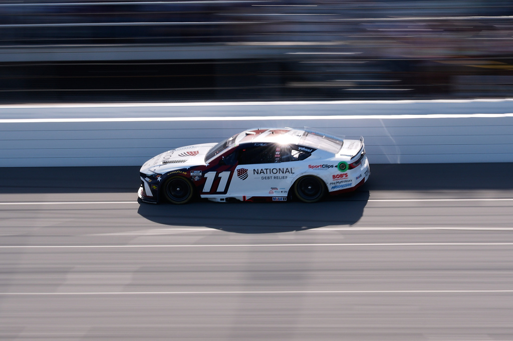 Denny Hamlin (11) drives during a NASCAR Cup Series auto race at Michigan International Speedway in Brooklyn, Mich., Sunday, June 7, 2026. (AP Photo/Paul Sancya)