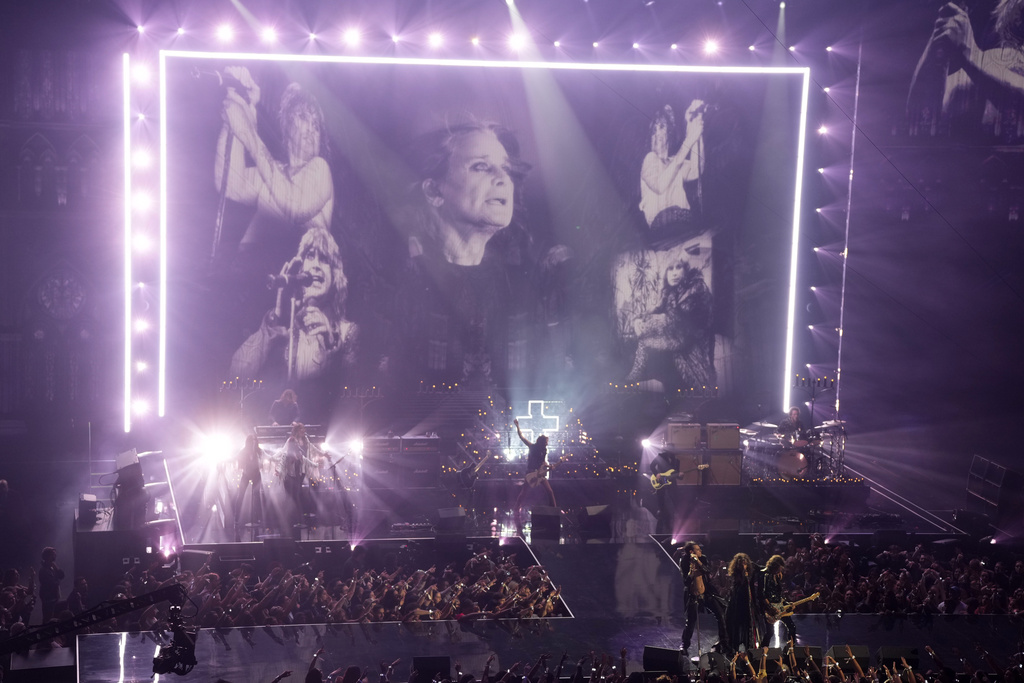 Yungblud, from left, Steven Tyler, and Joe Perry perform a tribute to Ozzy Osbourne during the MTV Video Music Awards on Sunday, Sept. 7, 2025, at UBS Arena in Elmont, N.Y. (Photo by Charles Sykes/Invision/AP)