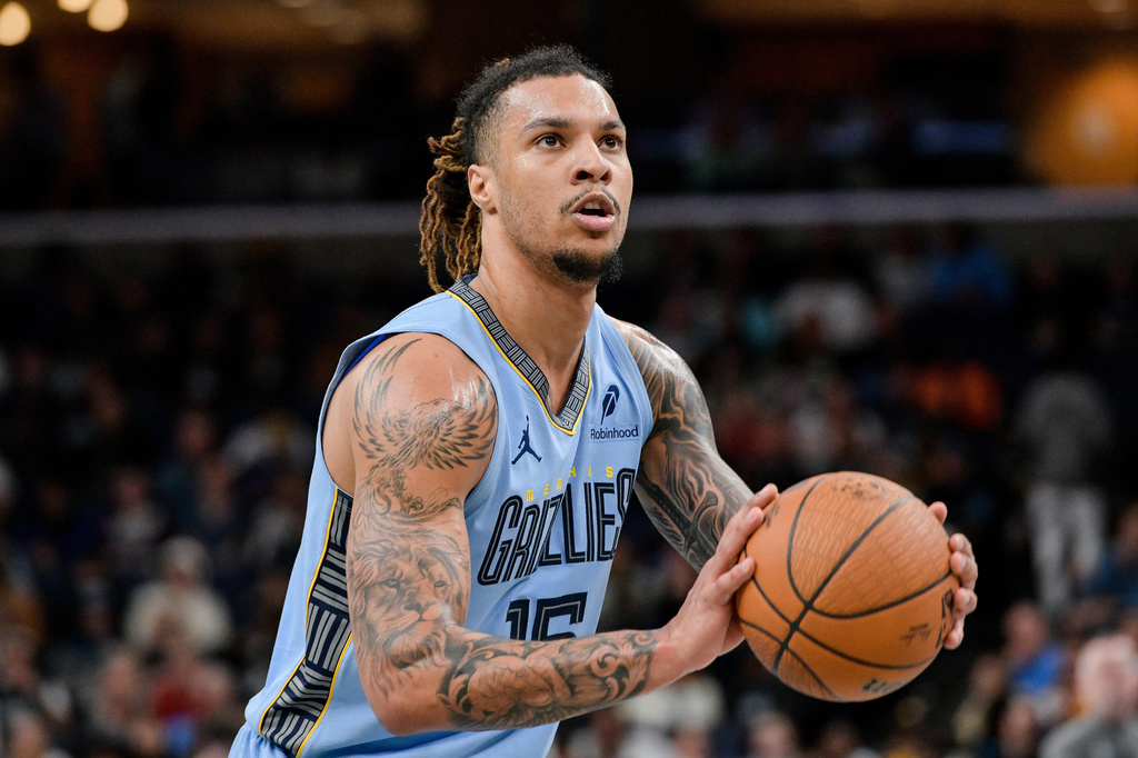 FILE - Memphis Grizzlies forward Brandon Clarke (15) shoots a free throw during an NBA Cup basketball game against the Denver Nuggets, Nov. 19, 2024, in Memphis, Tenn. (AP Photo/Brandon Dill, File)