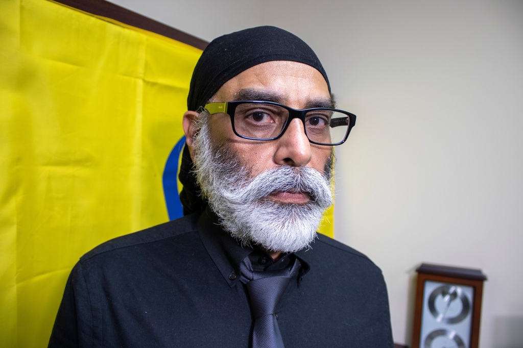 FILE - Sikh separatist leader Gurpatwant Singh Pannun stands in his office in New York on Nov. 29, 2023. (AP Photo/Ted Shaffrey, File)