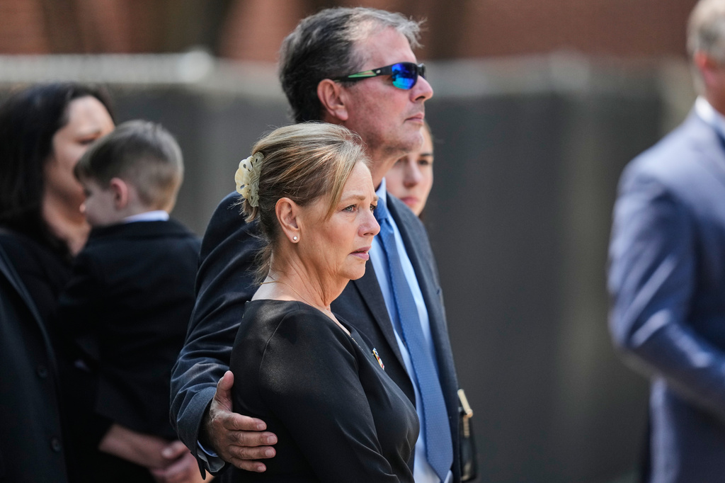 Sen. Darline Graham, R-S.C., the sister of the late Sen. Lindsey Graham, R-S.C., looks on as her brother's casket is carried out of First Baptist Church in Columbia, S.C., following a funeral service, Wednesday, July 29, 2026. (AP Photo/Gerald Herbert)
