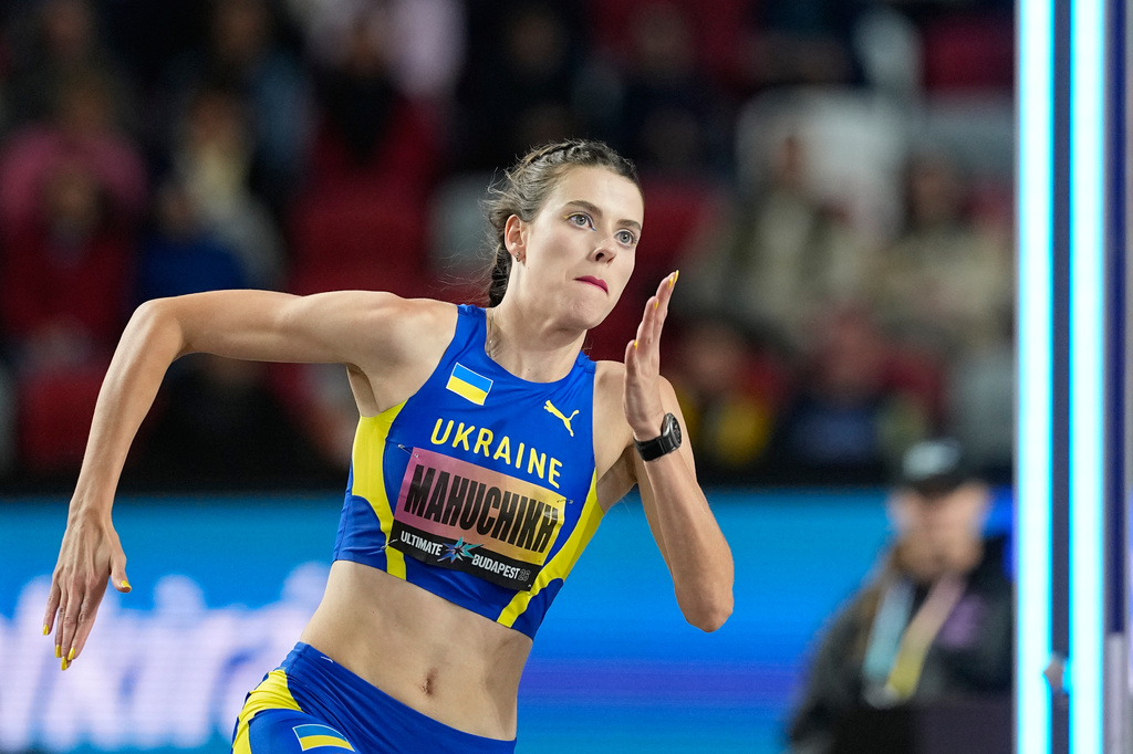 Yaroslava Mahuchikh, of Ukraine, makes an attempt in the women's high jump final at the World Athletics Ultimate Championship in Budapest, Hungary, Friday, Sept. 11, 2026. (AP Photo/Matthias Schrader)