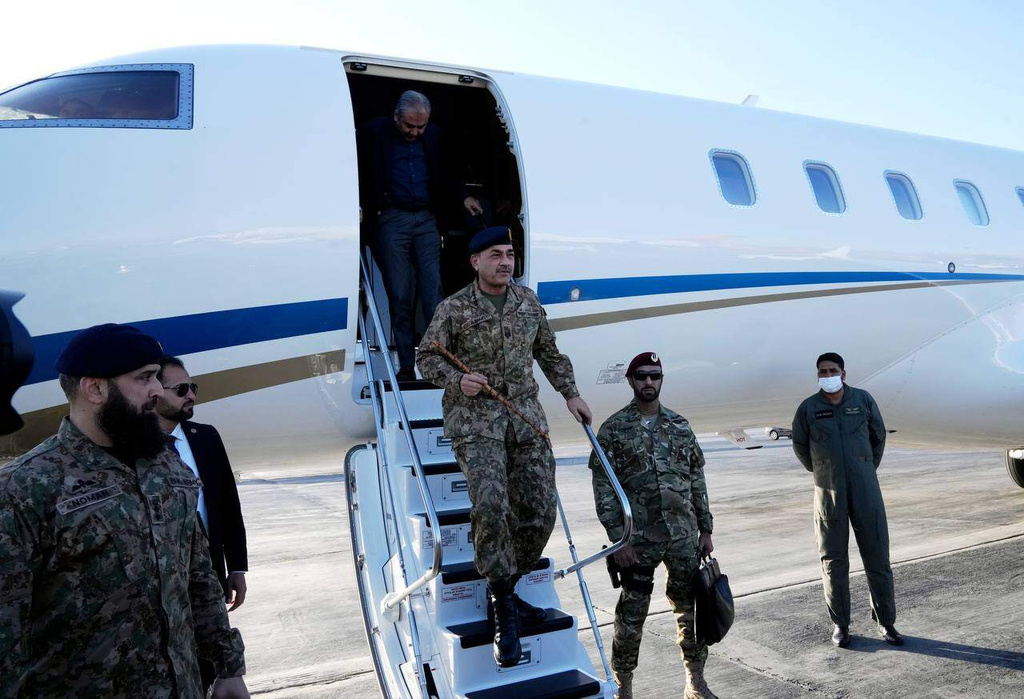 In this photo released by Telegram channel of the Iranian Foreign Minister Abbas Araghchi, Pakistan's Army Chief Field Marshal Gen. Asim Munir steps off the plane upon his arrival in Tehran, Iran, Wednesday, April 15, 2026. (Telegram channel of the the Iranian Foreign Minister Abbas Araghchi, via AP)