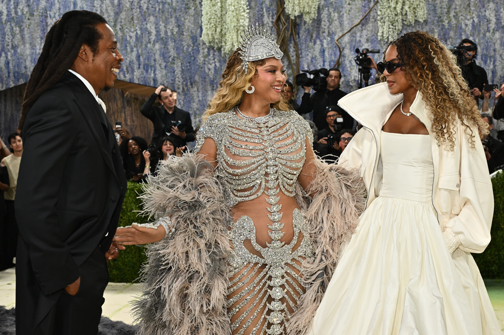 Jay-Z, from left, Beyoncé, and, Blue Ivy Carter arrive at The Metropolitan Museum of Art's Costume Institute benefit gala celebrating the opening of the "Costume Art" exhibition on Monday, May 4, 2026, in New York. (Photo by Evan Agostini/Invision/AP)