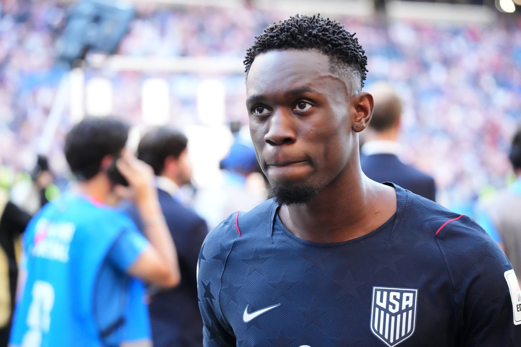 United States' Folarin Balogun (20) walks off the pitch after losing to Belgium in their World Cup round of 16 soccer match in Seattle, Monday, July 6, 2026. (AP Photo/Ted S. Warren)