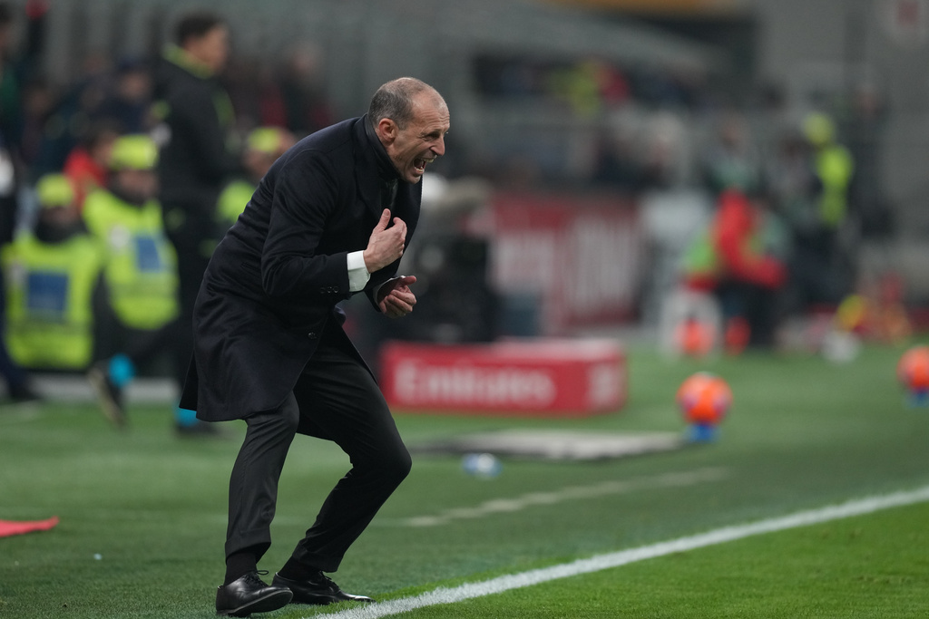 AC Milan's head coach Massimiliano Allegri reacts during the Serie A soccer match between AC Milan and Genoa, in Milan, Italy, Thursday, Jan. 8, 2026. (AP Photo/Antonio Calanni)