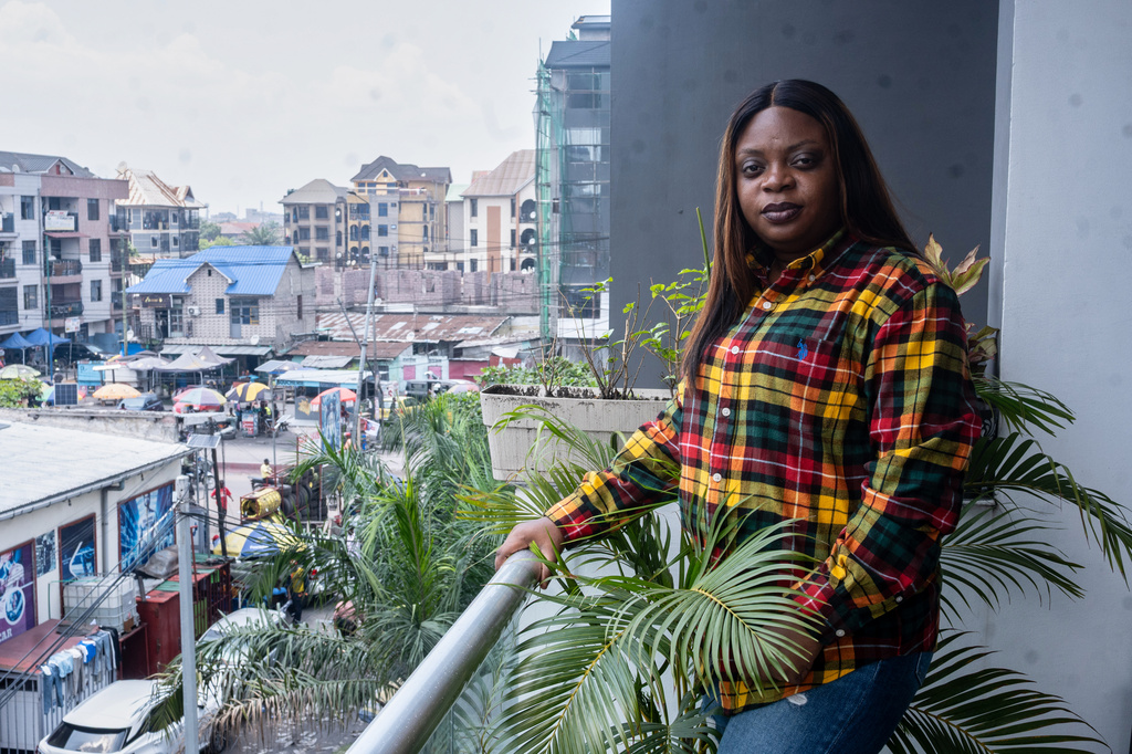 Gloria Masanka, a mother of two daughters, poses for a photo at her home in Kinshasa, Congo, Monday, April 6, 2026. (AP Photo/Samy Ntumba Shambuyi)