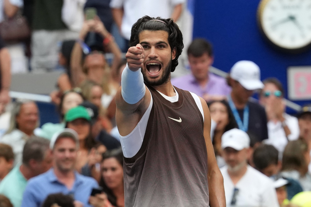 Carlos Alcaraz, of Spain, gestures after he won his match against Wu Yibing, of China, during the third round of the U.S. Open tennis championships Friday, Sept. 4, 2026, in New York. (AP Photo/Kirsty Wigglesworth)