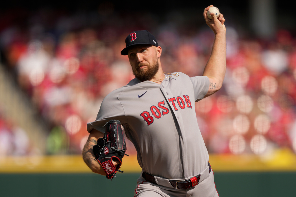 Boston Red Sox pitcher Garrett Crochet throws during the first inning of an opening-day baseball game against the Cincinnati Reds in Cincinnati, Thursday, March 26, 2026. (AP Photo/Carolyn Kaster)