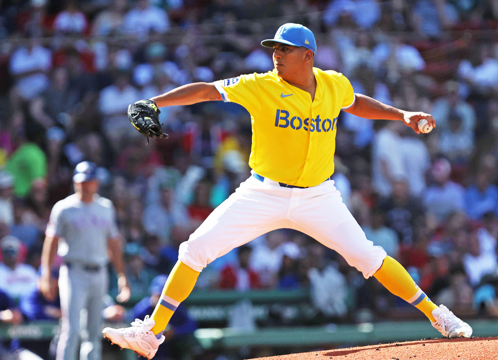Boston Red Sox pitcher Ranger Suarez delivers during the first inning of a baseball game against the Texas Rangers, Saturday, June 13, 2026, in Boston. (AP Photo/Jim Davis)