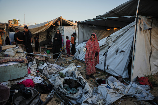 Displaced Palestinians inspect the damage after an Israeli army strike on their tent camp in Deir al-Balah, Gaza Strip, Wednesday, Oct. 29, 2025. (AP Photo/Abdel Kareem Hana) Displaced Palestinians inspect the damage after an Israeli army strike on their tent camp in Deir al-Balah, Gaza Strip, Wednesday, Oct. 29, 2025. (AP Photo/Abdel Kareem Hana)