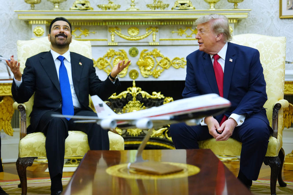 President Donald Trump meets with Iraq's Prime Minister Ali al-Zaidi in the Oval Office of the White House, Tuesday, July 14, 2026, in Washington. (AP Photo/Julia Demaree Nikhinson)