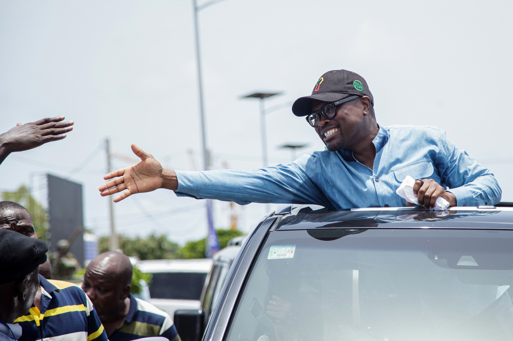 Presidential candidate Romuald Wadagni greets supporters at a campaign rally in Cotonou, Benin, Friday, April 10, 2026. (AP Photo/Abadjaye Justin Sodogandji)