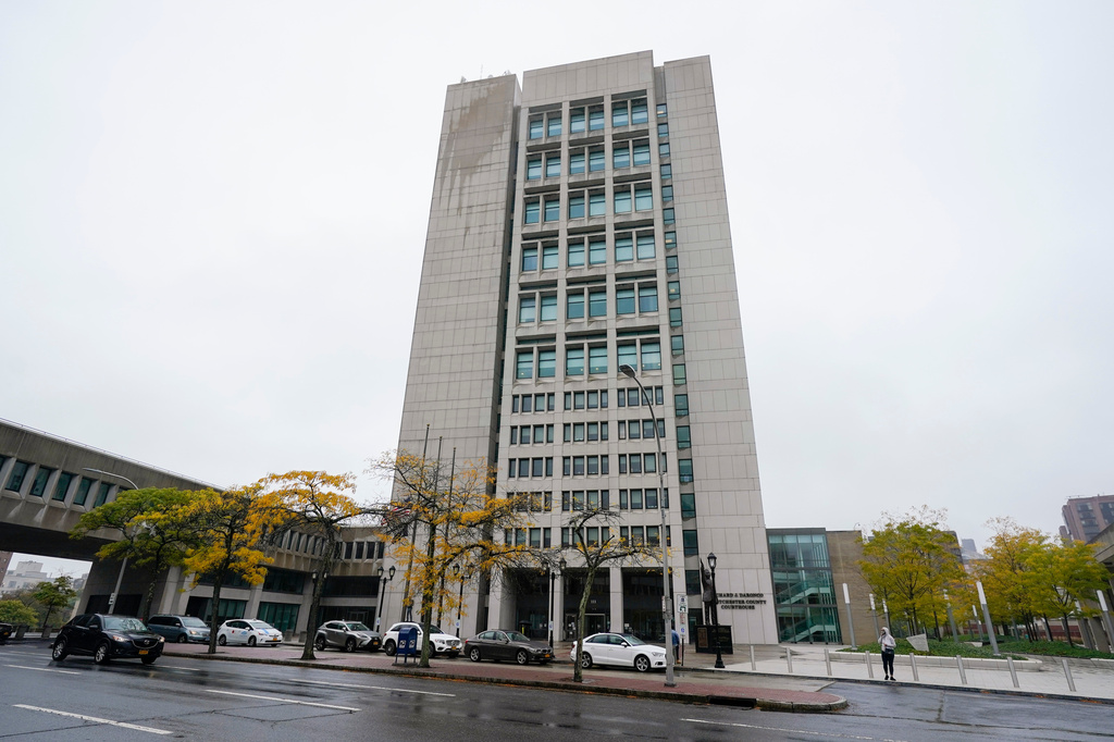 FILE - Pedestrians pass the Richard J. Daronco Westchester County Courthouse, Oct. 13, 2020, in New York. (AP Photo/Frank Franklin II, File)