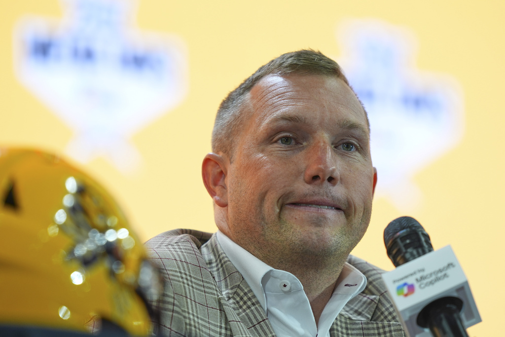 Arizona State head coach Kenny Dillingham listens to a question during the Big 12 NCAA college football media days in Frisco, Texas, Tuesday, July 8, 2025. (AP Photo/LM Otero)