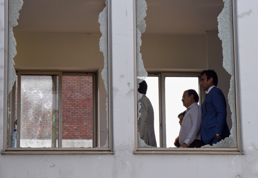 Investigators visit the hospital nursery where a fast-moving fire killed 14 newborns, in Islamabad, Pakistan, Thursday, Aug. 27, 2026. (AP Photo/Ehsan Shahzad)