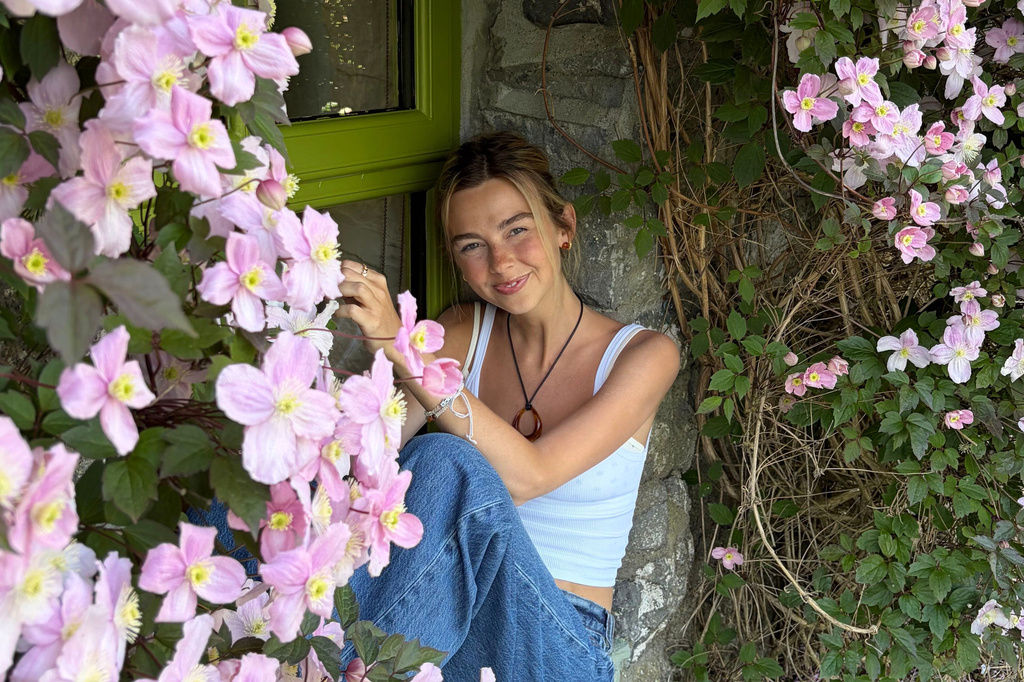 This undated photo provided by Elizabeth Morrow on Thursday, Aug. 6, 2026, shows Sydney Towle smiling for a photo. (Elizabeth Morrow via AP)