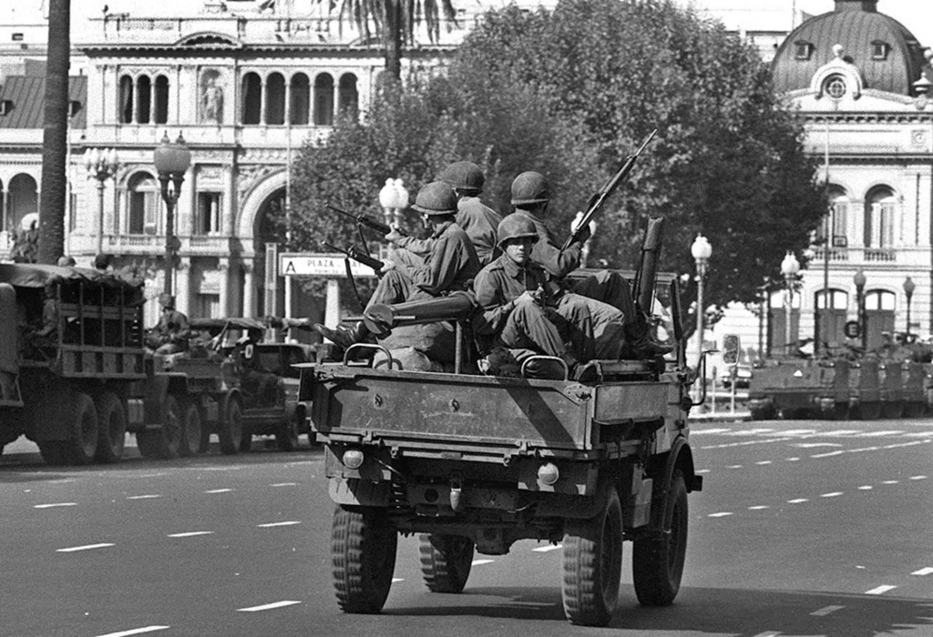FILE - Argentina's army troops patrol in Buenos Aires, Argentina, March 24, 1976, after a military coup overthrew President María Estela Martínez de Peron. (AP Photo/Eduardo Di Baia, File)