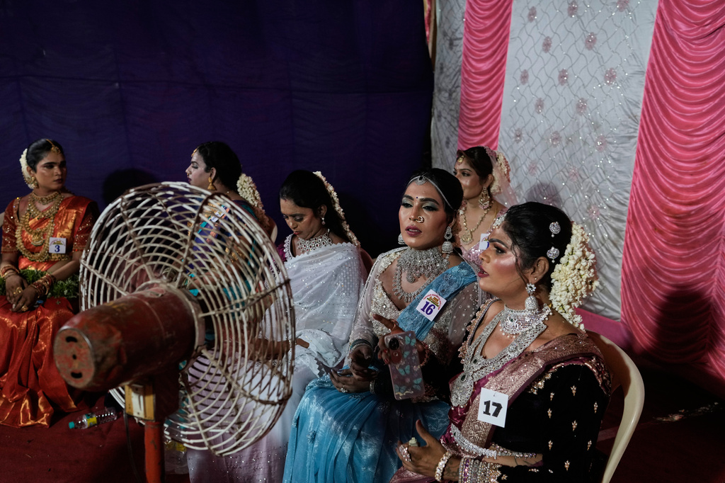 Transgender participants wait before taking part in Miss Koovagam 2026 beauty pageant during Koovagam festival, in Villupuram, India, Monday, April 27, 2026. (AP Photo/Mahesh Kumar A.)