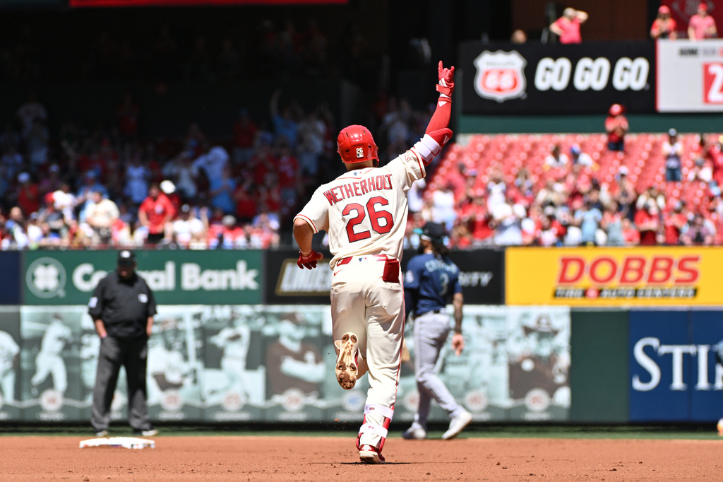 St. Louis Cardinals shortstop JJ Wetherholt reacts as he rounds the bases after hitting a home run against the Seattle Mariners during the first inning of a baseball game, Saturday, April 25, 2026, in St. Louis. (AP Photo/Jeff Le)