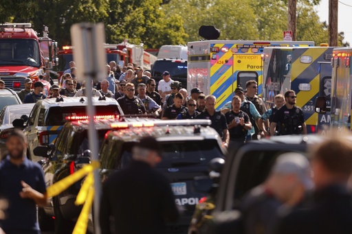 Law enforcement officers gather outside the Annunciation Church's school in response to a reported mass shooting, Wednesday, Aug. 27, 2025, in Minneapolis. (AP Photo/Bruce Kluckhohn) Law enforcement officers gather outside the Annunciation Church's school in response to a reported mass shooting, Wednesday, Aug. 27, 2025, in Minneapolis. (AP Photo/Bruce Kluckhohn)