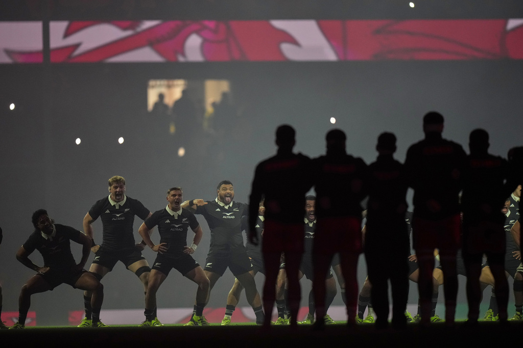 The New Zealand team perform the Haka before the Nation's Series rugby union international between Wales and New Zealand in Cardiff, Wales, Saturday, Nov. 22, 2025. (AP Photo/Alastair Grant)