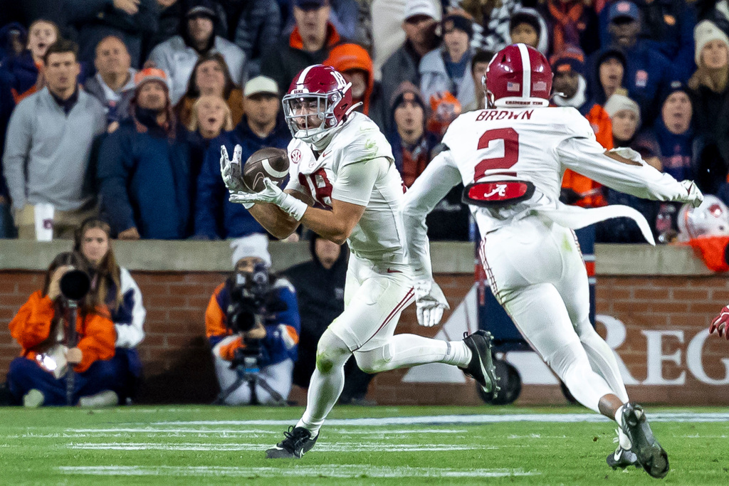 Alabama defensive back Bray Hubbard grabs an interception against Auburn during the second half of an NCAA college football game, Saturday, Nov. 29, 2025, in Auburn, Ala. (AP Photo/Vasha Hunt)