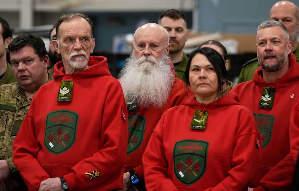 Canadian Rangers wait for Canadian Prime Minister Mark Carney to make an announcement to defend and transform Canada's Northern and Arctic regions, in Yellowknife, Northwest Territories, Thursday, March 12, 2026. (Adrian Wyld/The Canadian Press via AP)