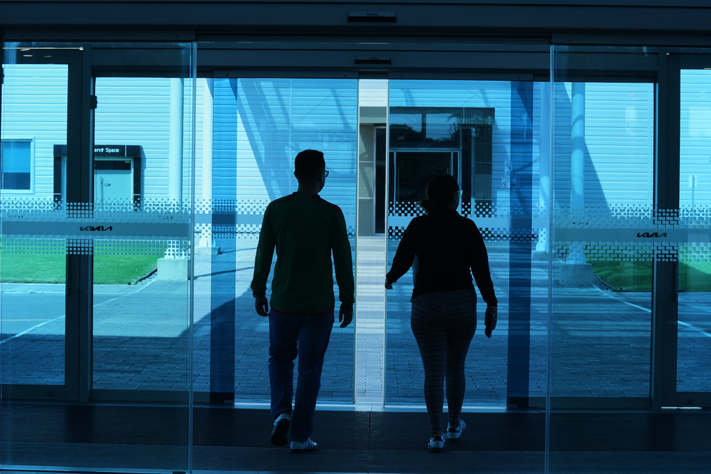 Employees leave the administrative offices at the KIA Motors plant in Pesqueria, Mexico, Tuesday, March 31, 2026. (APPhoto/Fernando Llano)