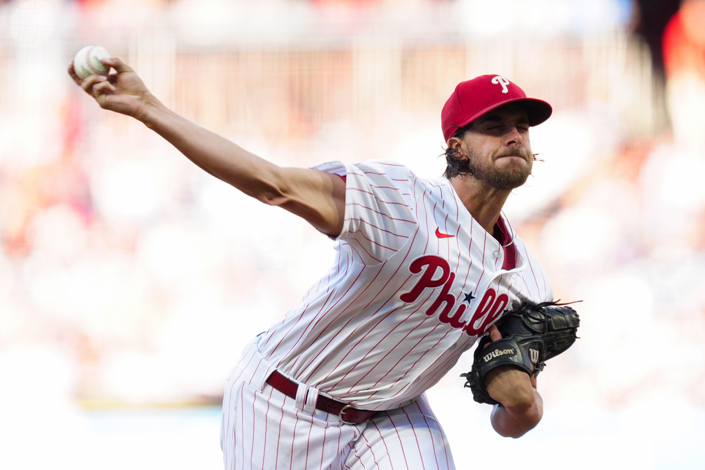 Philadelphia Phillies pitcher Aaron Nola throws during the first inning of a baseball game against the Washington Nationals, Saturday, Aug. 23, 2025, in Philadelphia. (AP Photo/Derik Hamilton)