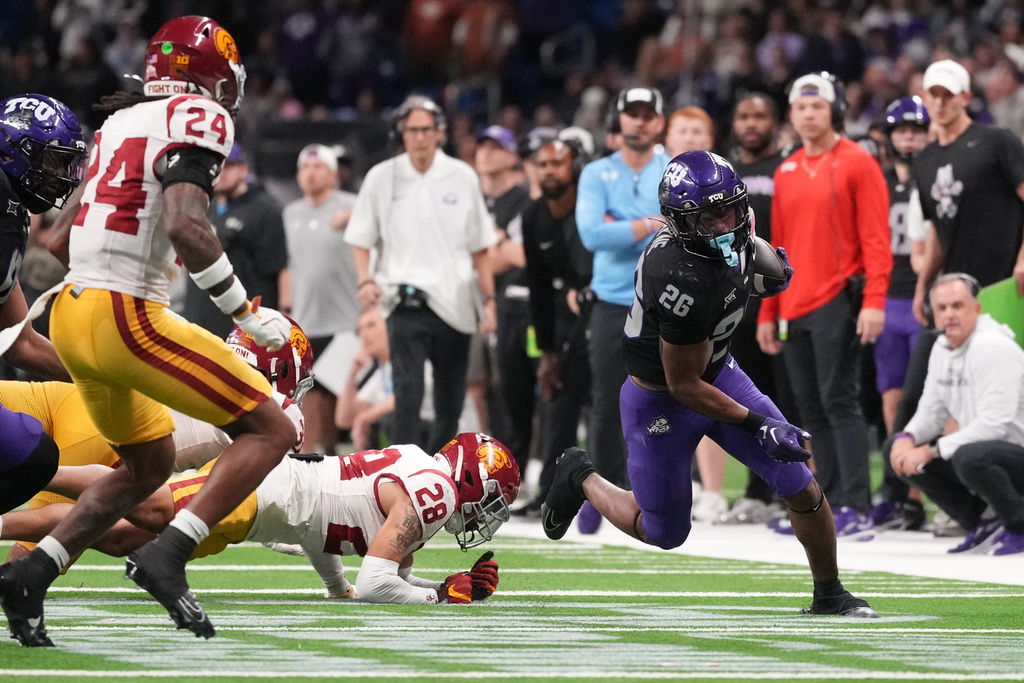 TCU running back Jeremy Payne (26) runs for a touchdown against Southern California during overtime in the Alamo Bowl NCAA college football game in San Antonio, Tuesday, Dec. 30, 2025. (AP Photo/Eric Gay)