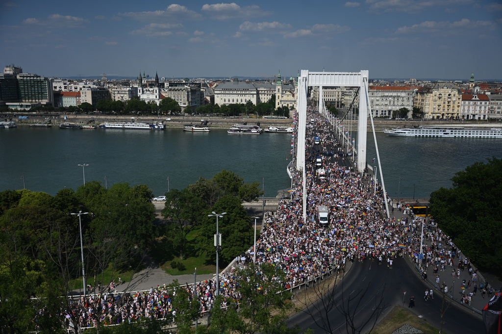 Participants cross the Elizabeth Bridge during the 31st Budapest Pride event in downtown Budapest, Hungary, Saturday, June 27, 2026. (Zoltan Balogh/MTI via AP)