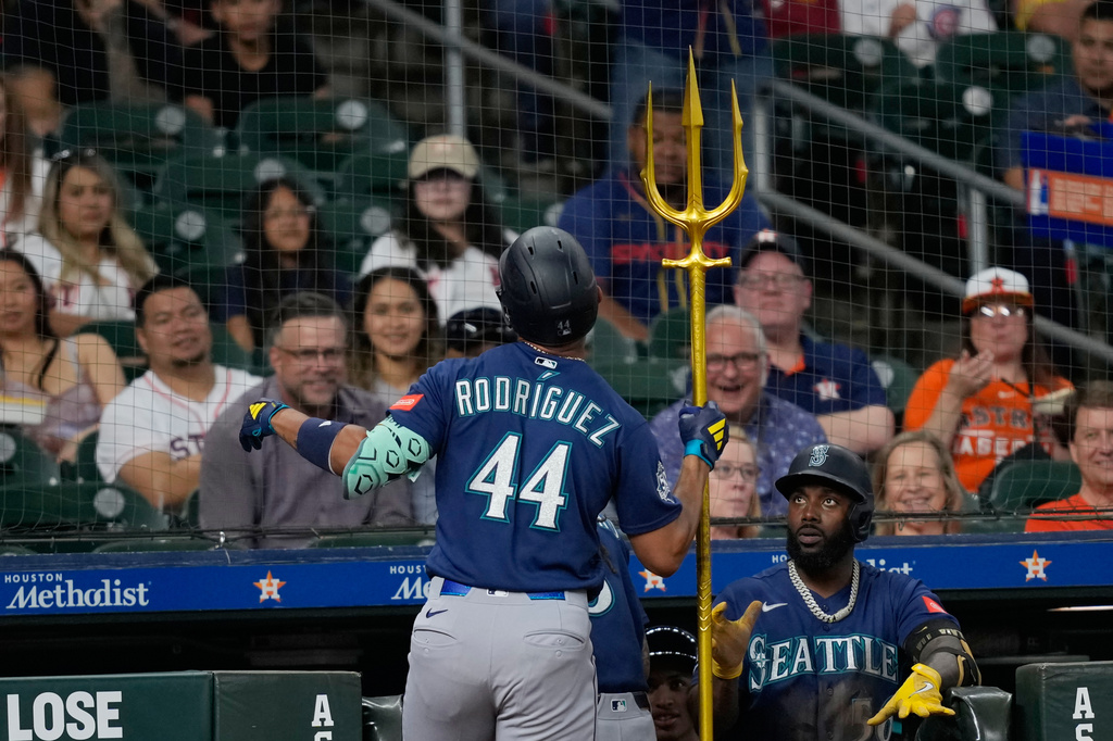 Seattle Mariners' Julio Rodríguez (44) celebrates after hitting a home run against the Houston Astros during the third inning of a baseball game Monday, May 11, 2026, in Houston. (AP Photo/David J. Phillip)
