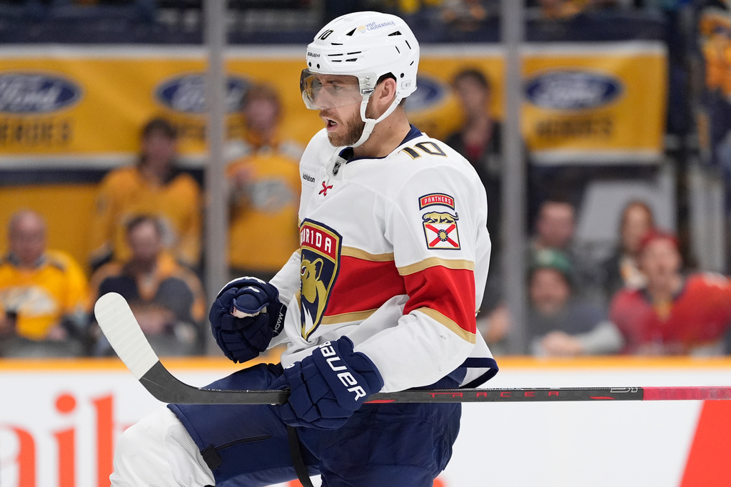 Florida Panthers left wing A.J. Greer (10) celebrates his goal during the third period of an NHL hockey game against the Nashville Predators, Monday, Nov. 24, 2025, in Nashville, Tenn. (AP Photo/George Walker IV)