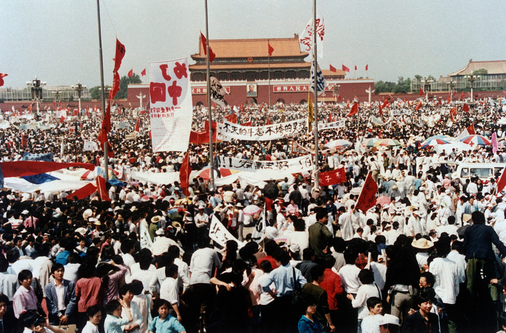 FILE - Tiananmen Square is filled with thousands of people during a pro-democracy rally, May 17, 1989, in Beijing. (AP Photo/Sadayuki Mikami, File)