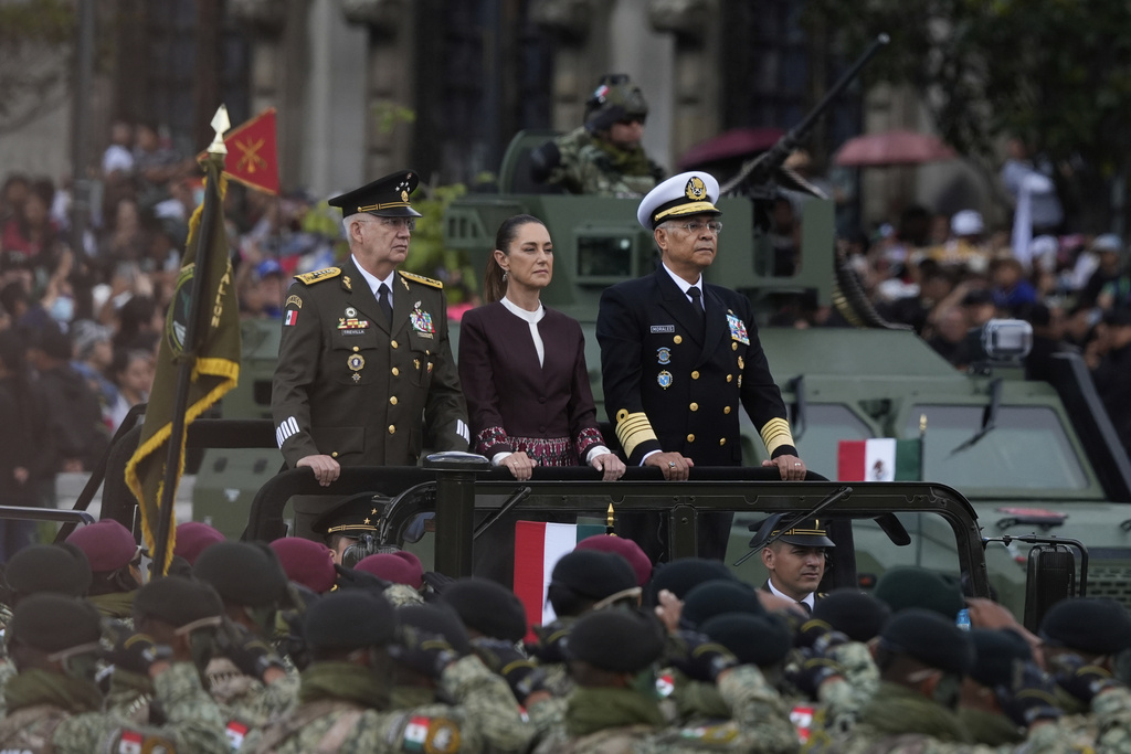 President Claudia Sheinbaum rides through the annual Independence Day military parade, in Mexico City, Tuesday, Sept. 16, 2025. (AP Photo/Fernando Llano)