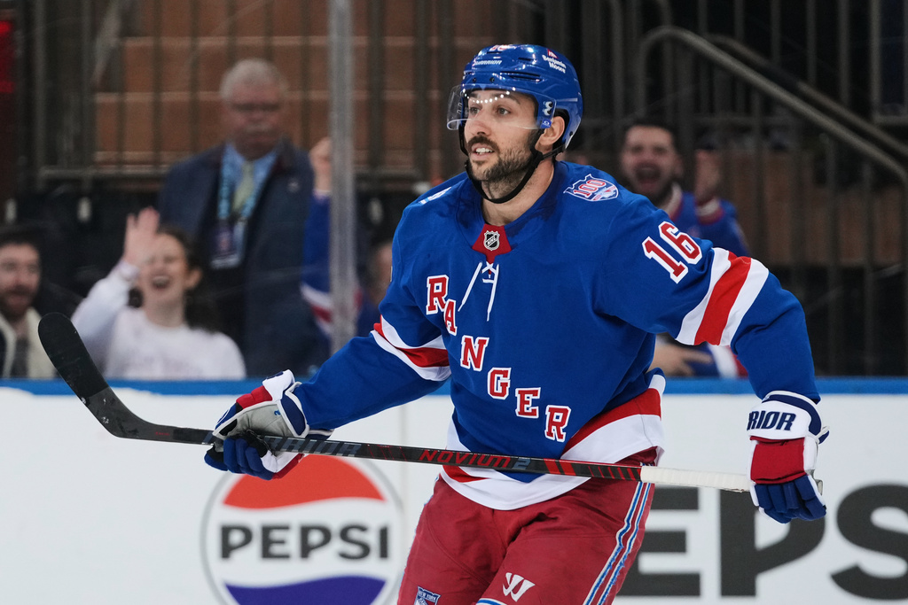 New York Rangers' Vincent Trocheck (16) reacts after scoring a goal during the shootout of an NHL hockey game against the Pittsburgh Penguins Saturday, Feb. 28, 2026, in New York. (AP Photo/Frank Franklin II)