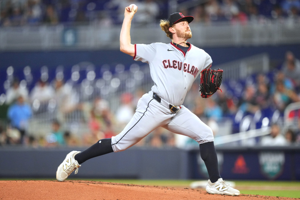 Cleveland Guardians starting pitcher Tanner Bibee throws during the first inning of a baseball game against the Miami Marlins, Saturday, July 11, 2026, in Miami. (AP Photo/Jim Rassol)