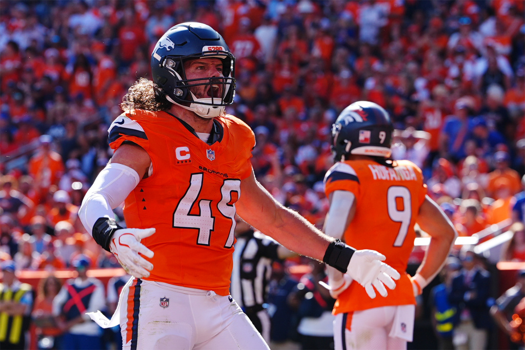 Denver Broncos linebacker Alex Singleton (49) celebrates after the Broncos stopped a drive by the Jacksonville Jaguars in the second half of an NFL football game in Denver, Sunday, Sept. 20, 2026. (AP Photo/David Zalubowski)