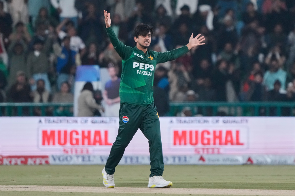 Pakistan's Saim Ayub celebrates after taking the wicket of Australia's Matthew Short during the first T20 cricket match between Pakistan and Australia, in Lahore, Pakistan, Thursday, Jan. 29, 2026. (AP Photo/K.M. Chaudary)