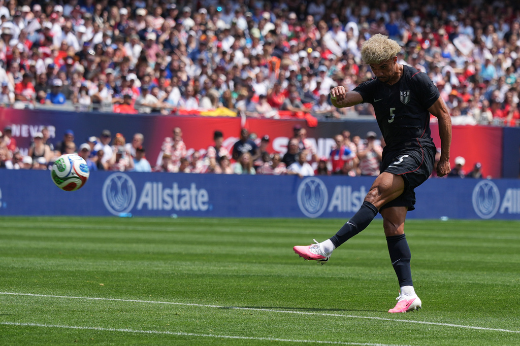 United States defender Antonee Robinson scores against Germany during the first half of an international friendly soccer match in Chicago, Saturday, June 6, 2026. (AP Photo/Nam Y. Huh)