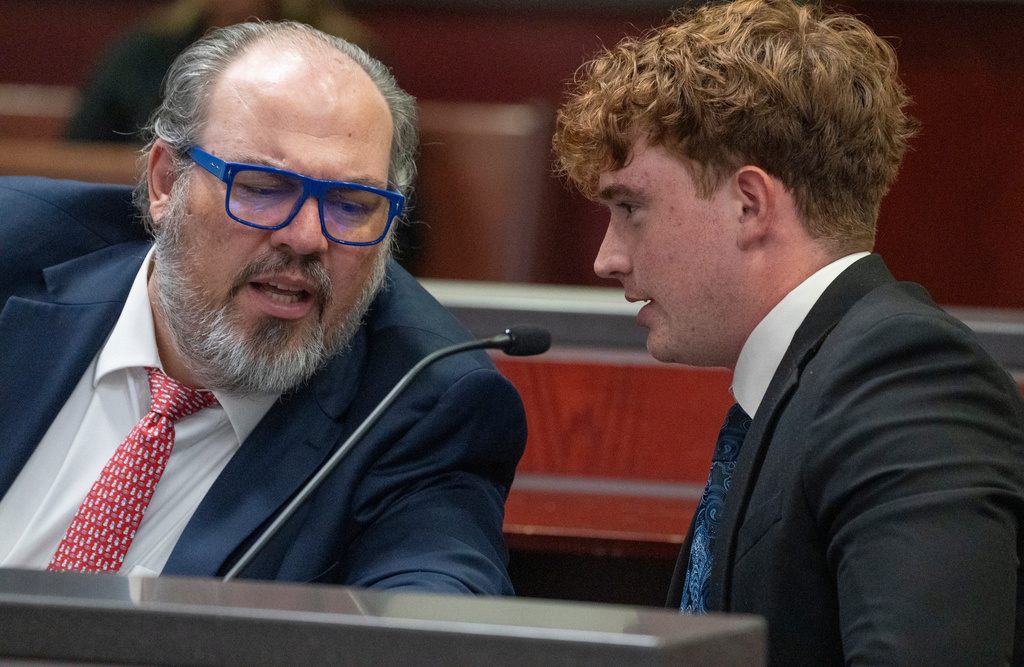 Carter Eslick, right, talks with his attorney, Burges McCowan, during his sentencing hearing in Coconino County Superior Court in Flagstaff, Ariz., on Wednesday, Sept. 30, 2026. (Mark Henle/The Arizona Republic via AP, Pool)