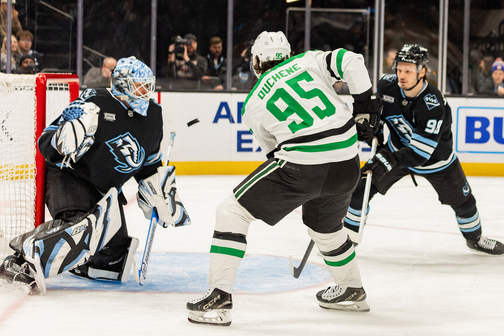 Dallas Stars center Matt Duchene (95) shoots the puck against Utah Mammoth goaltender Karel Vejmelka (70) during the second period of an NHL hockey game Saturday, Jan. 31, 2026, in Salt Lake City. (AP Photo/Melissa Majchrzak)