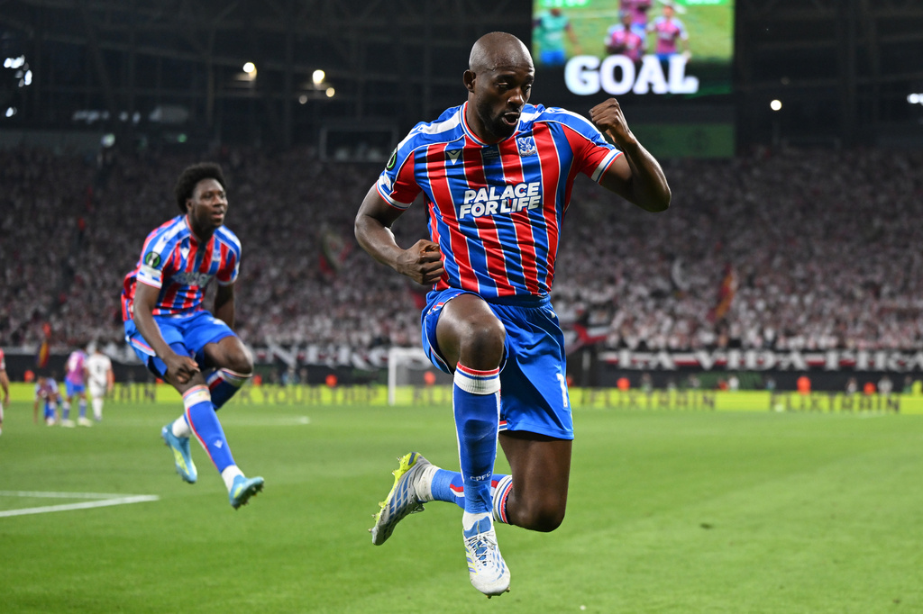 Crystal Palace's Jean-Philippe Mateta celebrates after scoring during the Europa Conference League final soccer match between Crystal Palace and Rayo Vallecano in Leipzig, Germany, Wednesday, May 27, 2026. (Robert Michael/dpa via AP)