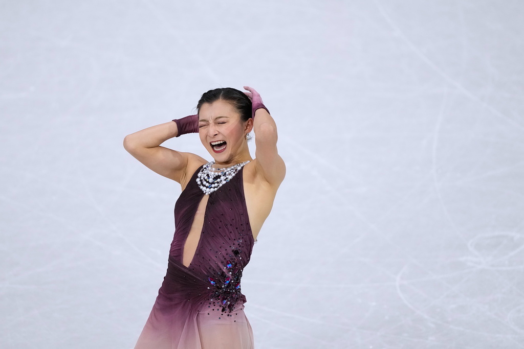 Kaori Sakamoto of Japan competes during the figure skating women's team event at the 2026 Winter Olympics, in Milan, Italy, Sunday, Feb. 8, 2026. (AP Photo/Natacha Pisarenko)
