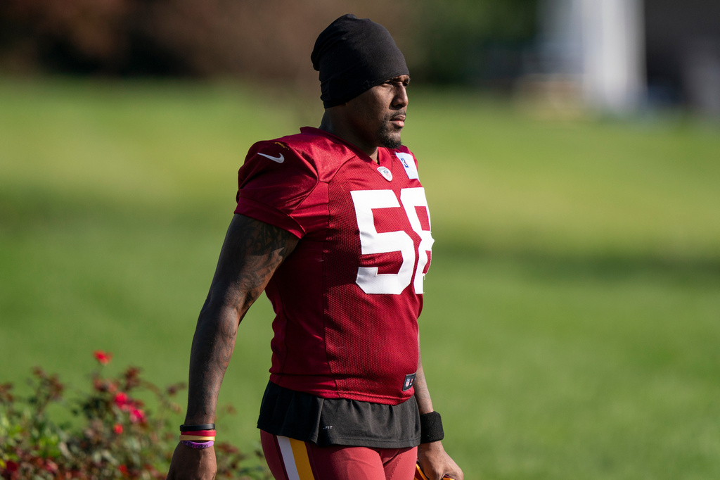 FILE - Washington linebacker Thomas Davis Sr. (58) arrives for practice at the team's NFL football training facility, Thursday, Aug. 20, 2020, in Ashburn, Va. (AP Photo/Alex Brandon, File)